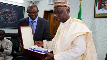 L-r:  Mr. Paul Ikele, registrar/chief executive officer, Nigerian Institute of Business Development (NIBD) presenting the award to Engineer Saleh Dunoma, managing director/CEO of FAAN